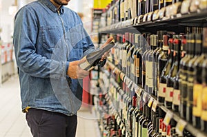 Man buying wine