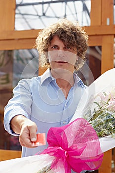Man buying flowers