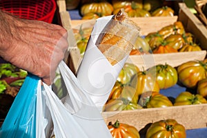 Man buying food on local market