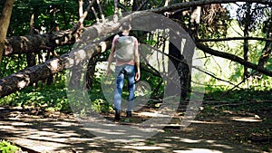 Man bypasses fallen trees