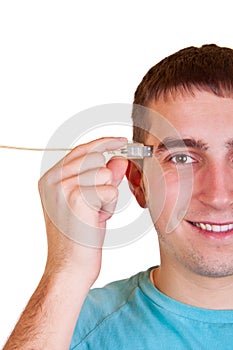 Man with cable connected to his head