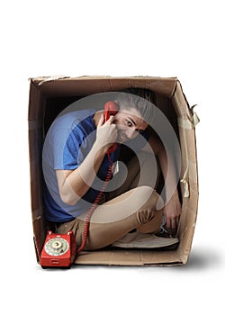 Man calling from a box