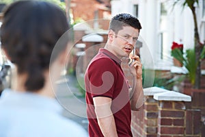 Man Calling For Help On Mobile Phone Whilst Being Stalked On Cit