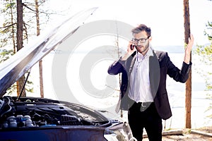 Man calling roadside assistance