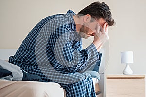 Man can`t sleep in bed suffering insomnia