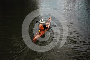 Man canoing on the lake photo