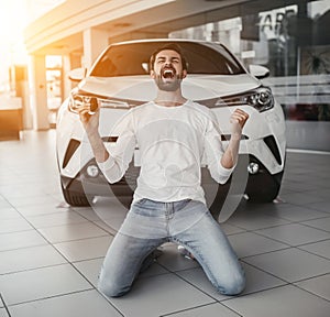 Man in car dealership