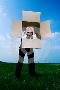 Man in Cardboard Box