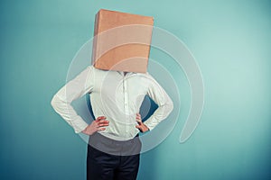 Man with cardboard box on his head