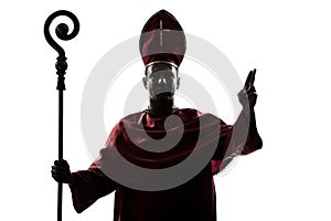 Man cardinal bishop silhouette saluting blessing
