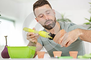 man caring about plants