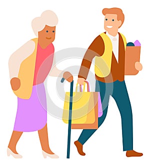 Man carrying grocery bags for old woman. Guy helping senior