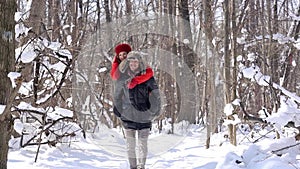 Man carrying his woman piggyback on a winter day