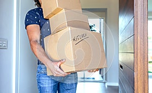 Man carrying moving boxes