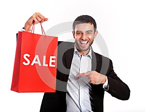 Man carrying a red sale shopping bag