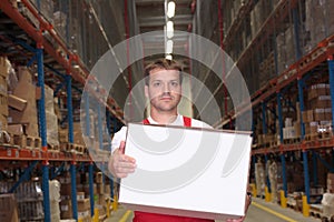 Man carrying white box