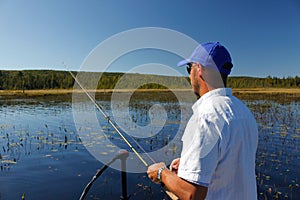 Man Fishing for Largemouth Bass