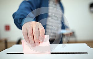 Man casts his ballot at elections