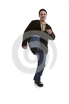 Man in casual clothes kicking