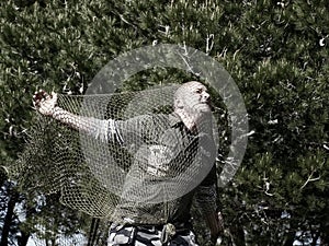 Man Caught in Net