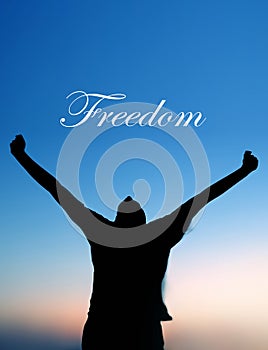 Man Celebrating at Sunset with Freedom text