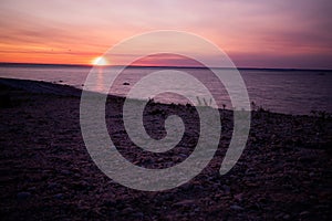 Simple beach and sand landscape with sunset ocean background