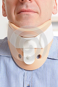 Man in cervical collar