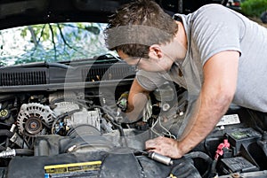 Man Changing Spark Plugs