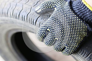 Man changing tire wheels winter