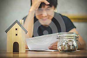 Man checking bills and having financial problems with home debt, Money concept., real estate, buy an apartment