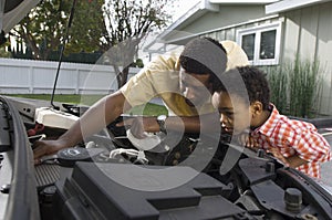 Man Checking The Engine Of Car