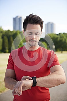 Man checking how many calories he burned