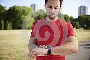 Man checking how many calories he burned after workout