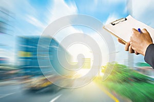 Man checking Illegal speeding traffic in the capital blurred background