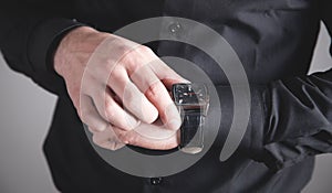 Man checking time on his wrist watch