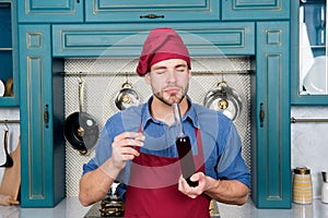 Man chef smell wive vinegar. Red Wine Vinegar benefits. perfect quality. strong aroma. intensity of flavor. enjoy using