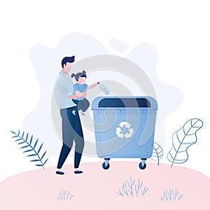 Man with a child throw garbage in the trash can.Recycling concept