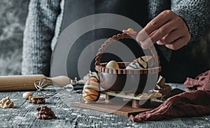 man with a chocolate basket as spanish mona de pascua photo