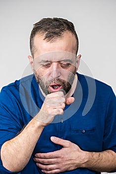 Man choking, coughing having flu