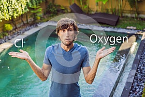 Man chooses chemicals for the pool chlorine or oxygen. Swimming pool service and equipment with chemical cleaning