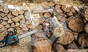 Man chopping wood with a chainsaw