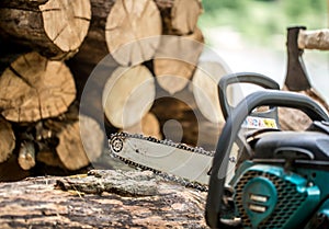 Man chopping wood with a chainsaw
