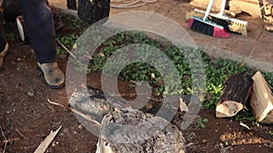 Man chopping woods with ax in countryside close up. lumber Man cutting woods, winter, cold, firewood