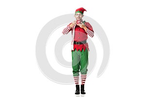 man in christmas elf costume with eyes closed holding cup of tea and inhaling aroma isolated