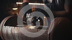 Man with circular saw for metalworking