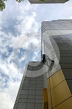 Man cleaning building