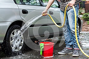 Man cleaning car