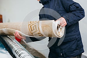 Man cleaning carpet