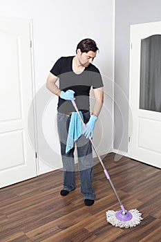 Man cleaning flat