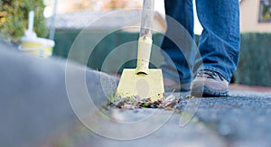 Man is cleaning the gutter